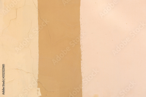 colored beige pastel color concrete wall texture background © Ali