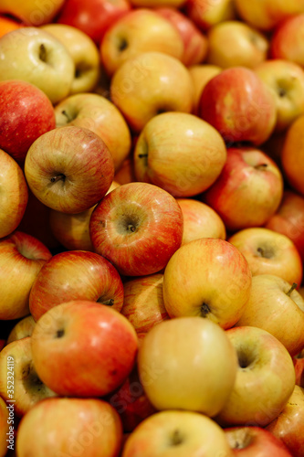 Large group of ripe red apples background