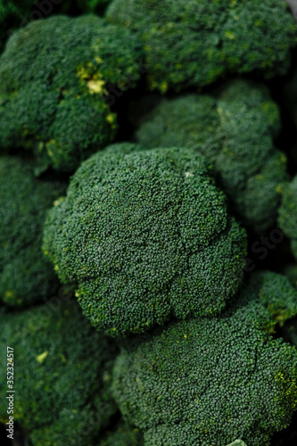 Group of fresh broccoli close up background