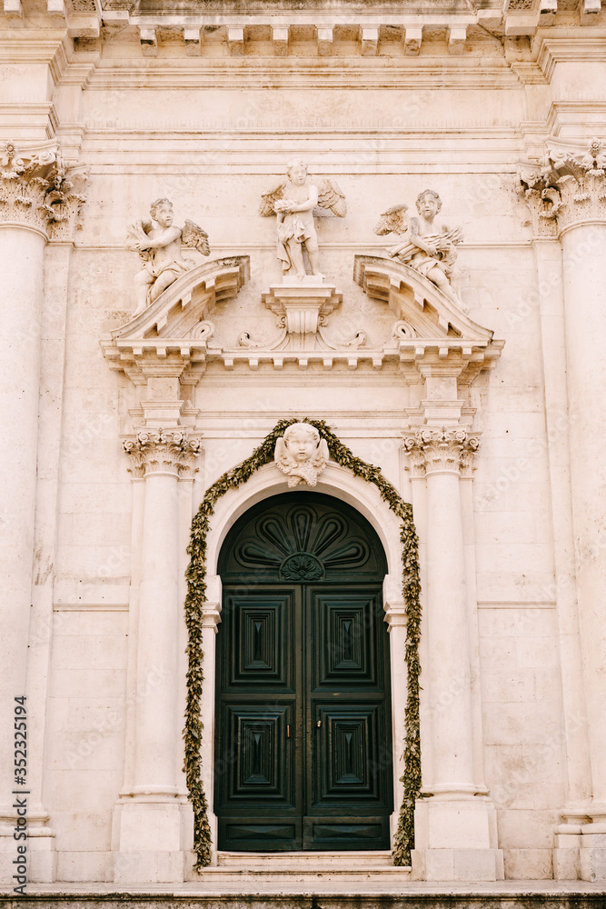 Sculptures of Angels above the entrance of Saint Blaise Church In Dubrovnik, Croatia