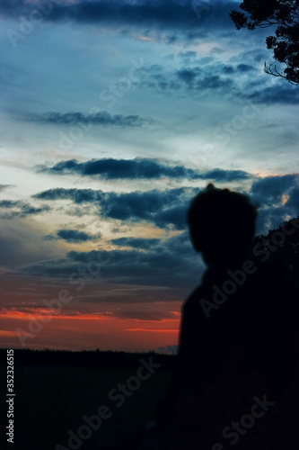Silhouette of a man in a field 
