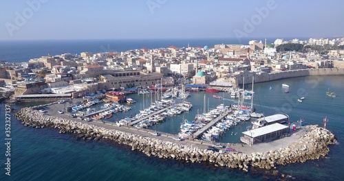 Acre Israel: Aerial footage of the old City and the ancient port and marina.