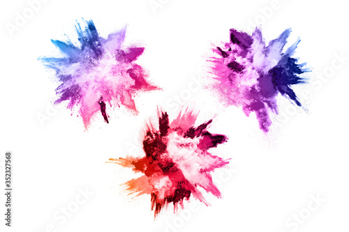 abstract powder splatted background. Colorful powder explosion on white background. Colored cloud. Colorful dust explode. Paint Holi. © kitsana