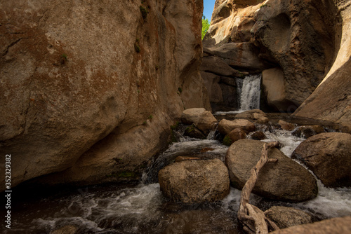 Hidden Falls waterfall on McGee Creek in natural rock canyon in the Buttermilks of Eastern Sierra Nevada mountains of California USA
