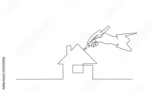 Hand of people painting house with paintbrush.