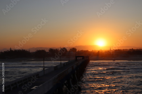 Beautiful sunset at Atlantida Pier © IVAN