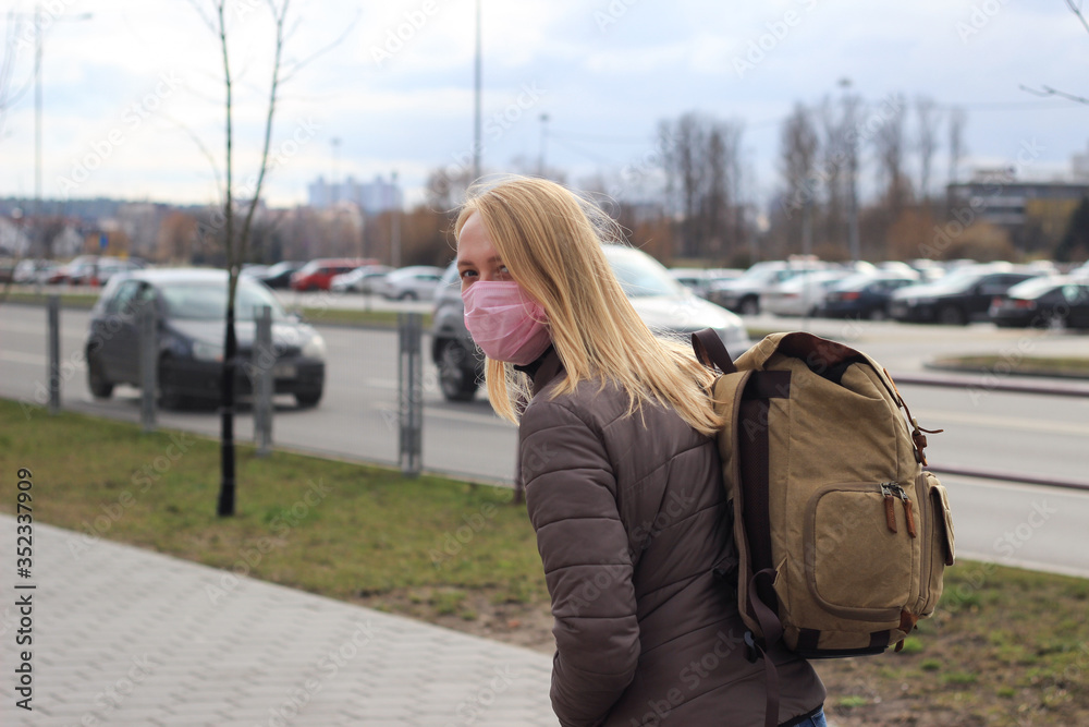 masked woman outdoors coronavirus disease