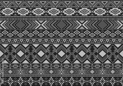 Ikat pattern tribal ethnic motifs geometric seamless vector background. Graphic ikat tribal motifs clothing fabric textile print traditional design with triangle and rhombus shapes.