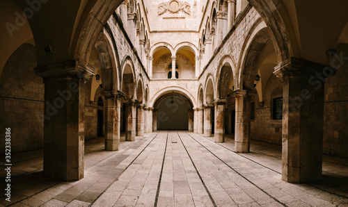 The interior of the Sponza Palace in Dubrovnik  Croatia. Courtyard with columns and open-air arches.