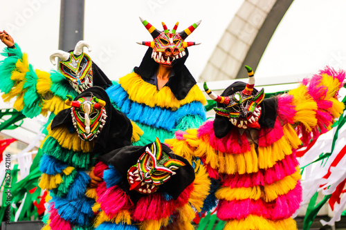 Disguised people dancing