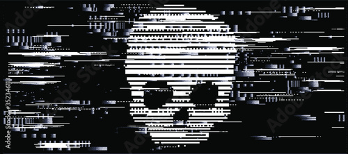 Computer code on a screen with a skull representing a computer virus, hack attack, malware and ransomware.