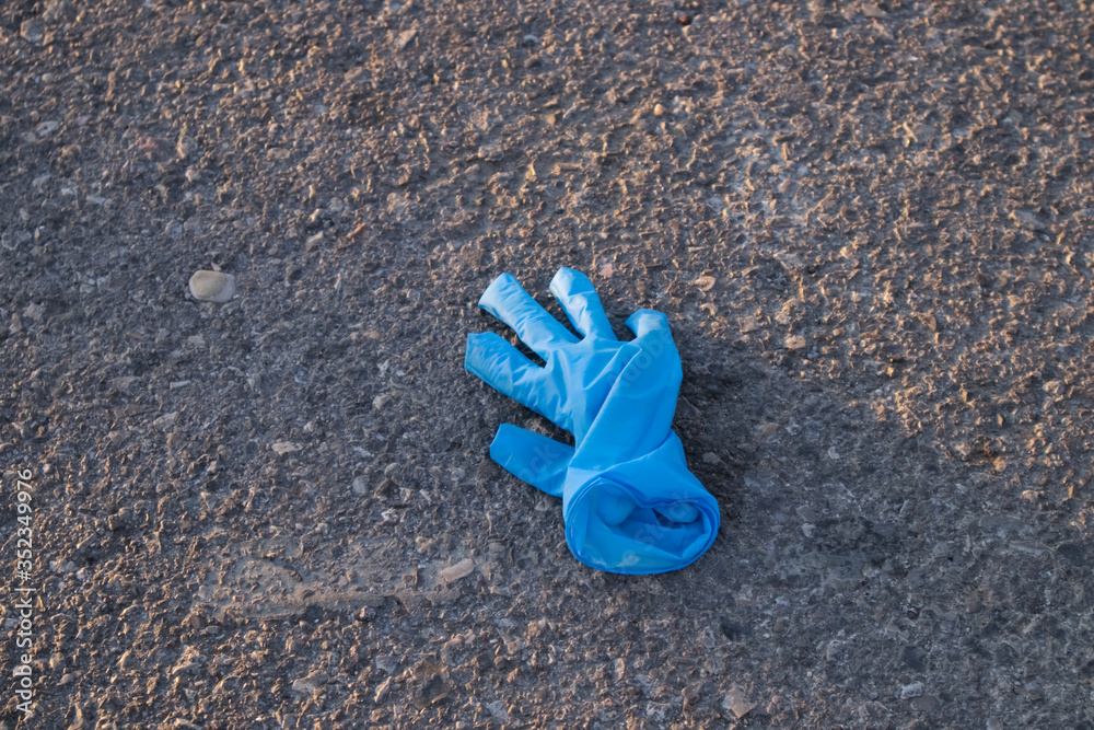 Fototapeta premium A glove used to protect against the coronavirus
