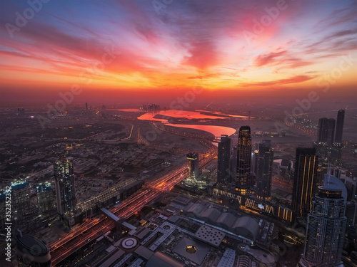 Dubai skyline at sunrise. United Arab Emirates landscape, modern city from above.