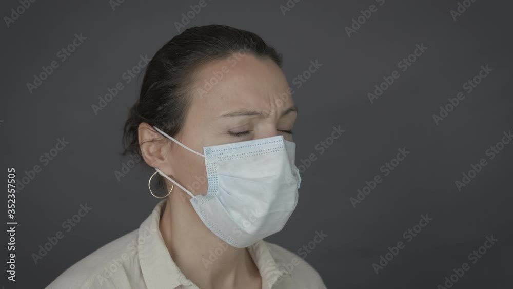 Save from infection. Frightened woman in a protective mask. Save from infection. Frightened woman in a protective mask.