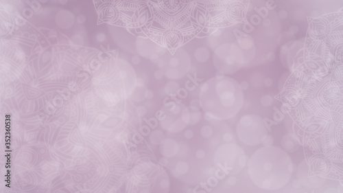 Soft pink and mauve textured bokeh background with mandalas photo