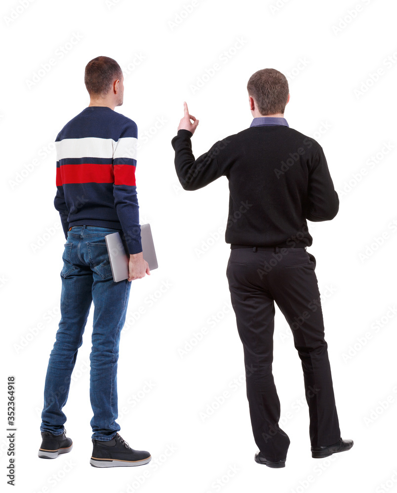Back view two man in sweater with laptop. Back view two man in sweater with laptop.