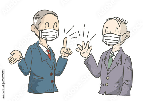マスクをして会話するビジネスマン
