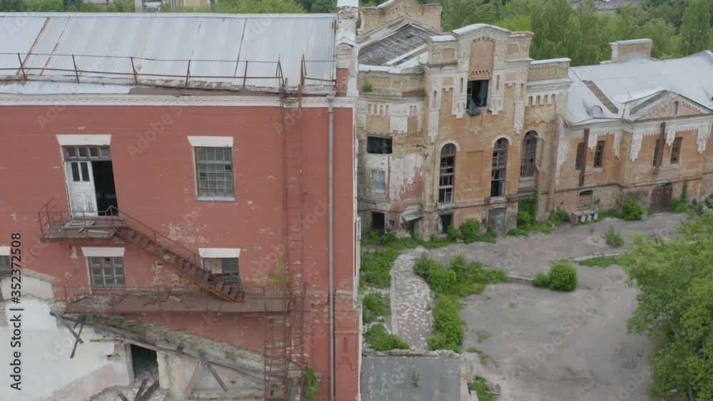 Abandoned factory. Old industrial 19th century buildings for demolition. Aerial view Abandoned factory. Old industrial 19th century buildings for demolition. Aerial view