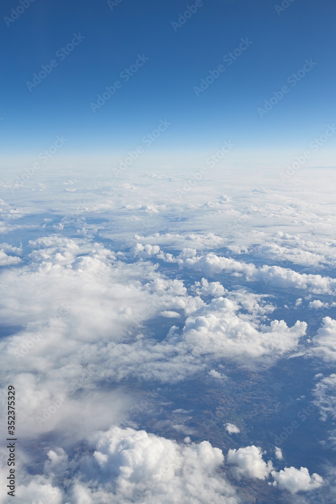 Clouds seen from above on a plane flight Clouds seen from above on a plane flight
