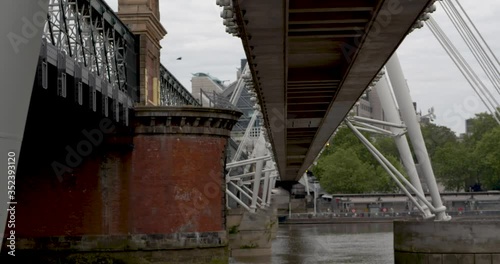 Empty City of London during coronavirus lockdown, Southbank, underneath Charing Cross Bridge, Embankment, A bird flies past photo