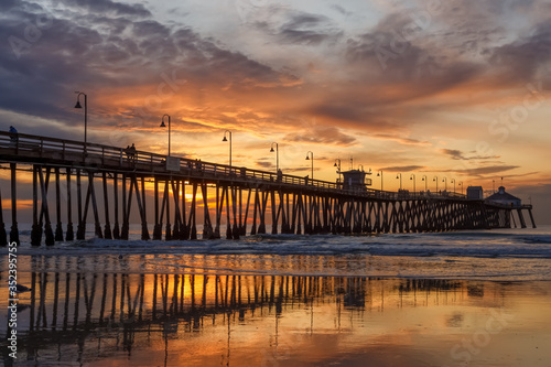 Brilliant sunset over a wooden beach pier. Imperial Beach  California  United states of America