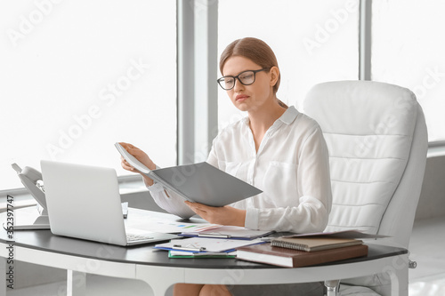 Beautiful female secretary ...