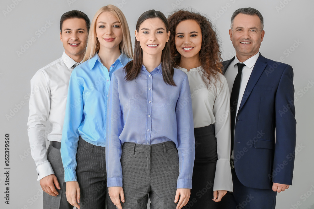 Portrait of business people on grey background Portrait of business people on grey background