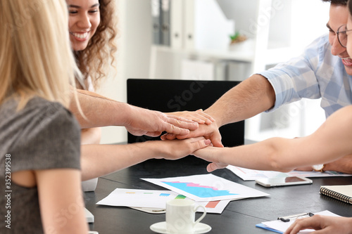 Group of business people pu...