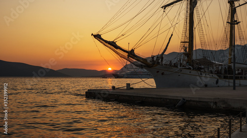 View of the setting sun in the seaport