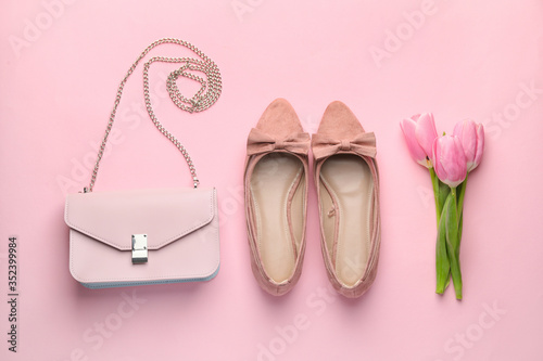 Wallpaper Mural Stylish bag with female shoes and flowers on color background Torontodigital.ca