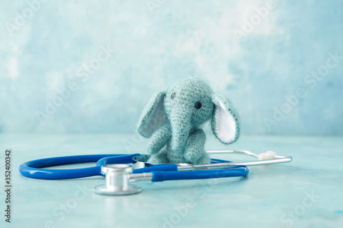 Toy with stethoscope on col...