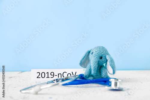 Toy with stethoscope on table