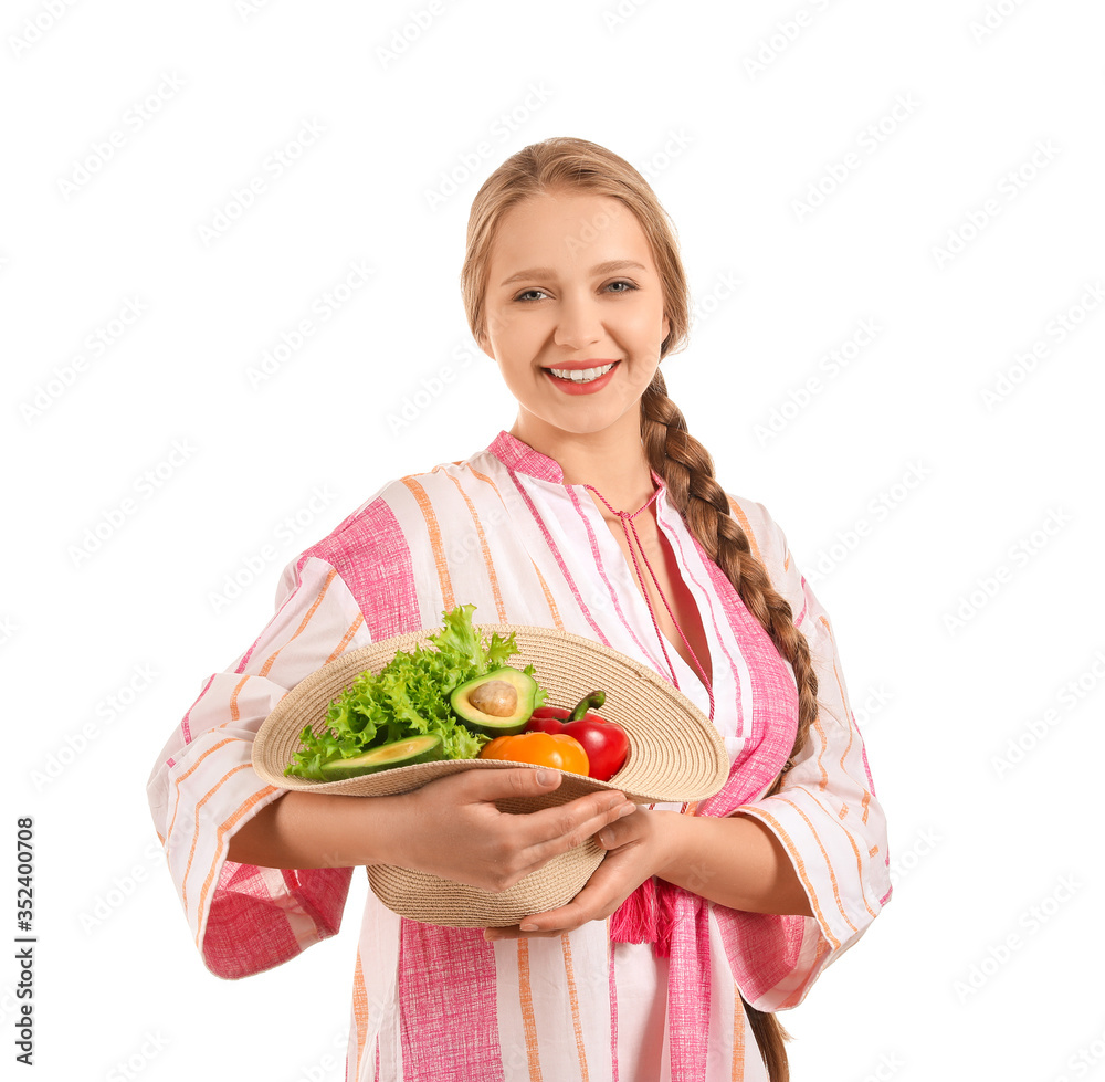 Young woman with healthy products on white background. Diet concept Young woman with healthy products on white background. Diet concept