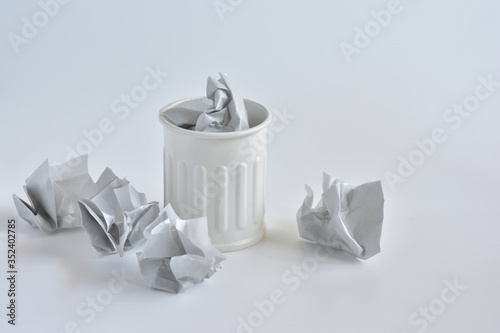 Garbage can on a white background 
