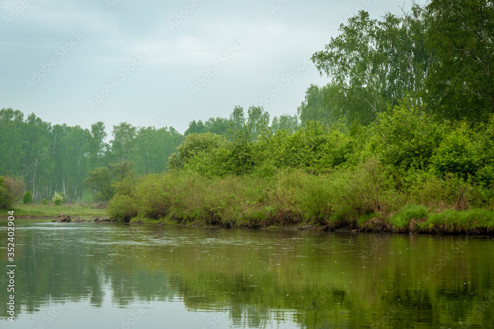 Morning in nature with a river, fields, trees. Aerial view.