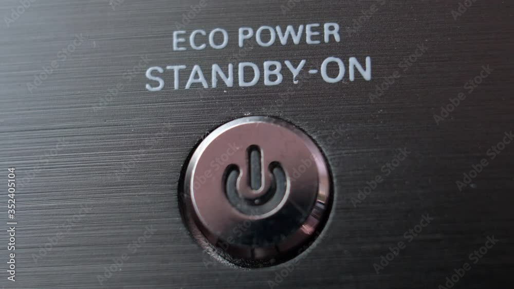 Pressing Stand By Power Button Close-Up