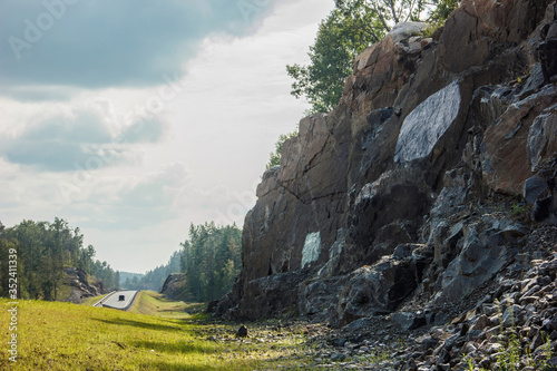 Rocky landscape at the road in the summer