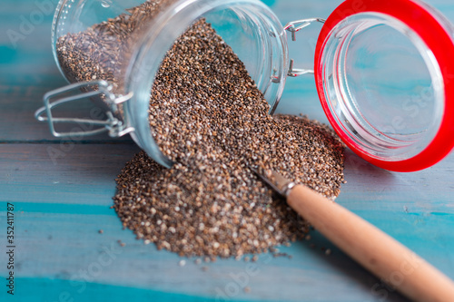 Chaia on blue table, superfood, healthy food photo