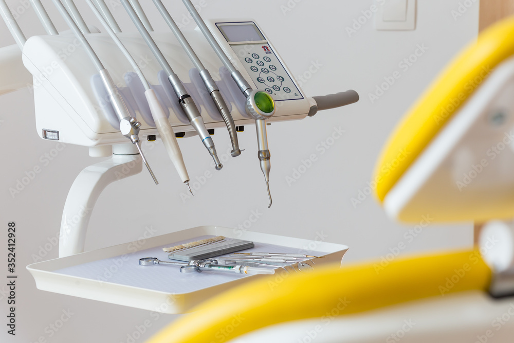 Medical equipment and stomatology concept, yellow dentistry Medical equipment and stomatology concept, yellow dentistry