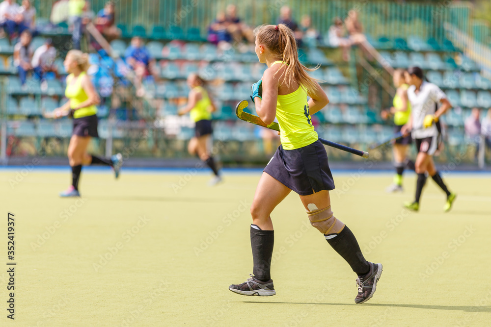 Female field hockey player in the game