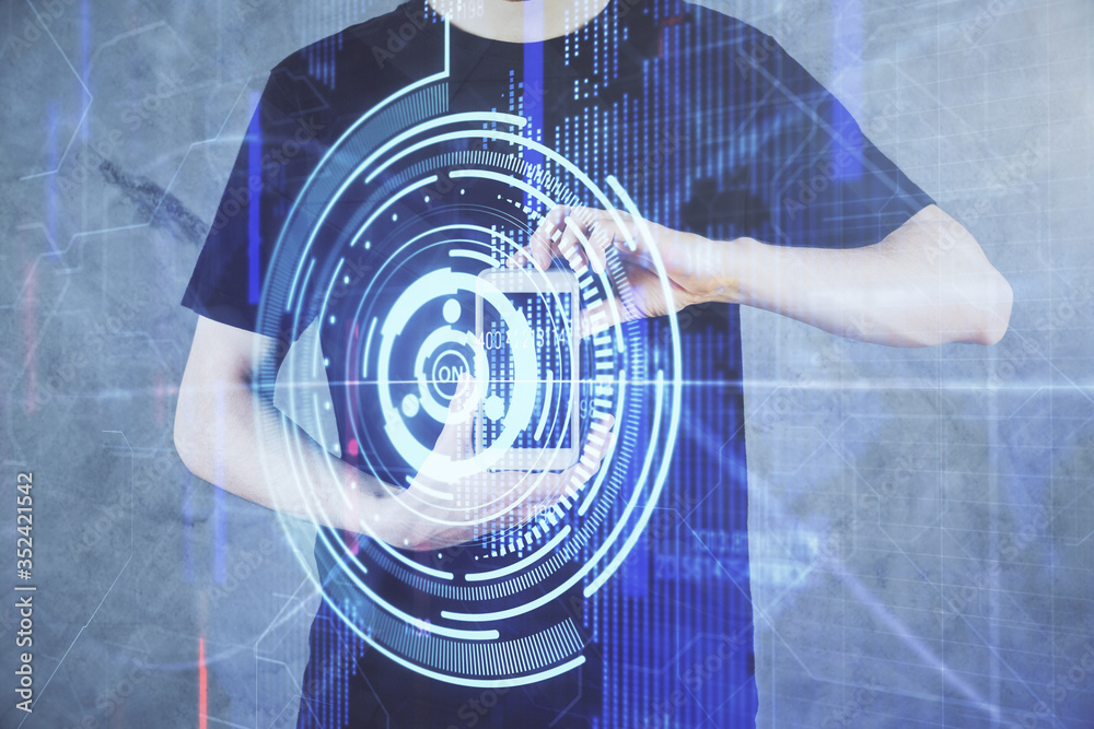 Fototapeta premium Double exposure of man's hand holding and using a digital device and data theme hologram drawing. Technology concept.