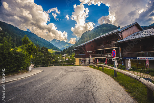 Areches-Beaufort, France, 20.6.2019.  View of French Alps in summer. Beautiful  ski rezort village Areches in France mountains alps photo