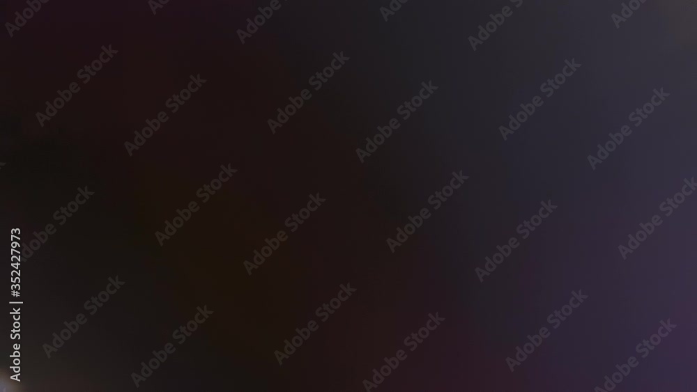 Colorful glitter, spots and flares in lens from a bright light source on a black background as additional material during montage, or as background
Colorful glitter, spots and flares in lens from a bright light source on a black background as additional material during montage, or as background