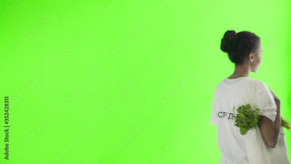 Woman holding bag with vegetables on chroma key background Woman holding bag with vegetables on chroma key background