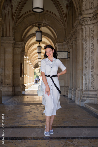 woman in dress near old building in Vienna