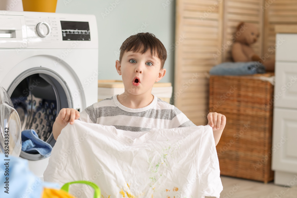 Little boy with dirty clothes at home Little boy with dirty clothes at home