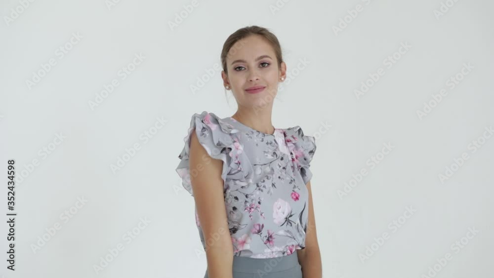The business woman took off her jacket against a white background.New vacancies The business woman took off her jacket against a white background.New vacancies