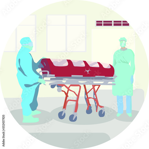 Transportation of an infected patient - biohazard. Doctors with a Biological Isolation Chamber