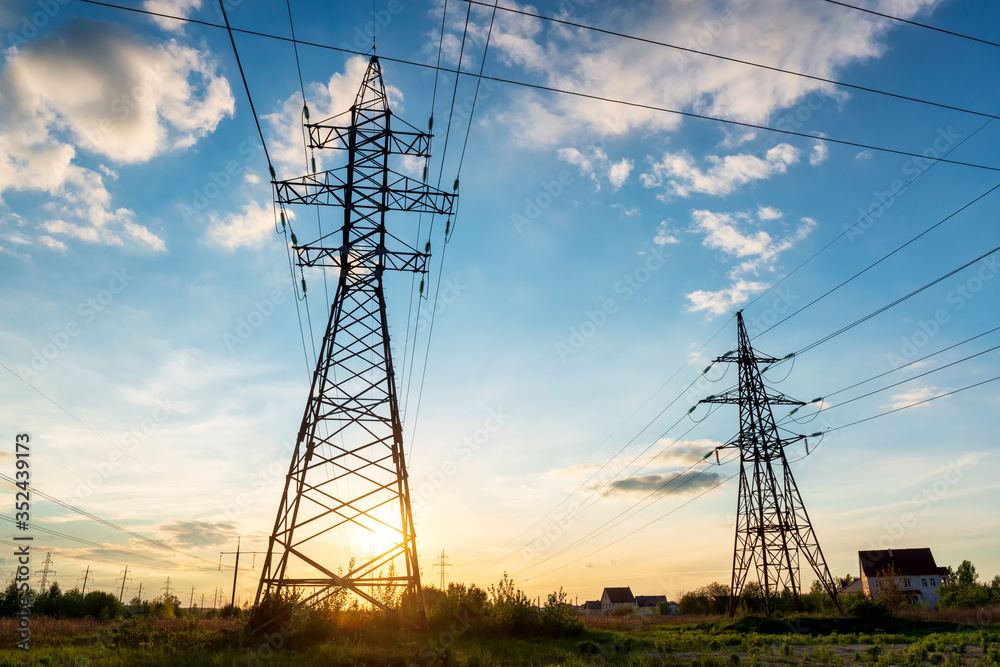 Power lines grid at sunset. Power lines grid at sunset.