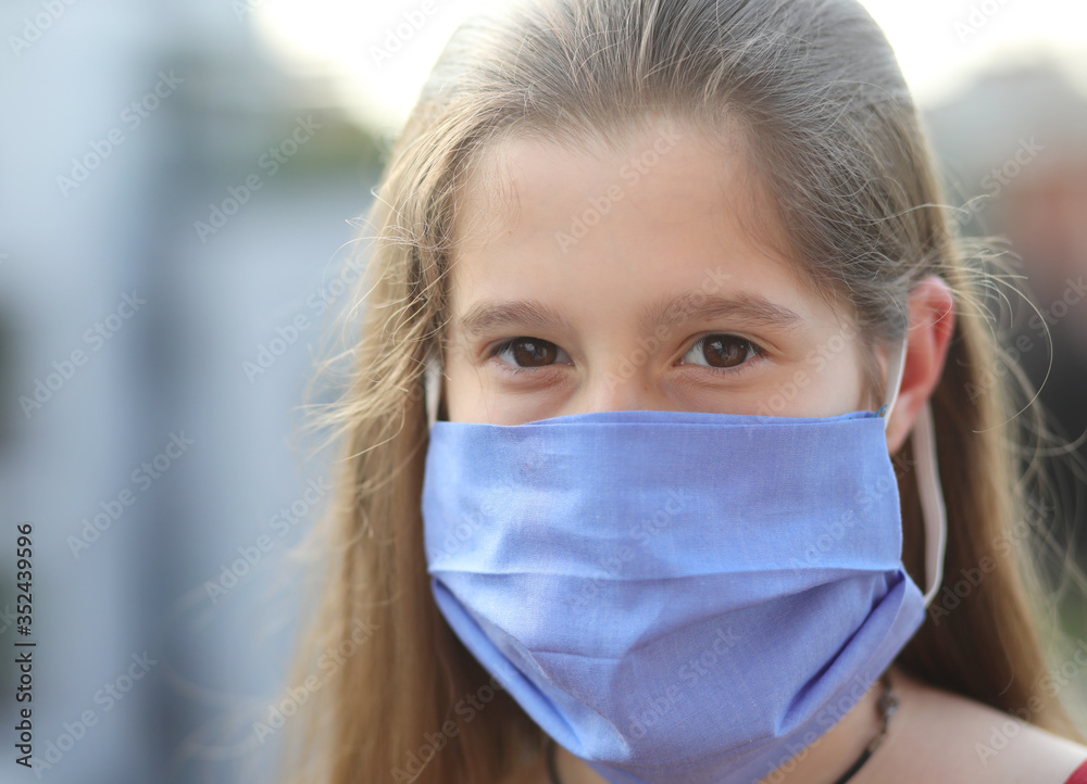 girl with surgical mask to protect herself from the CORONA VIRUS girl with surgical mask to protect herself from the CORONA VIRUS